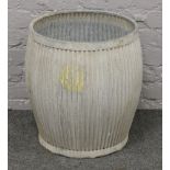 A ribbed galvanised steel dolly tub.