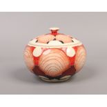 A Moorcroft trial lidded bowl decorated with scallop shells.