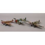 Three Franklin Mint Diecast metal model aircraft including Royal Navy Hellcat II and a Hawker