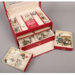 A fitted jewellery box and quantity of costume jewellery.