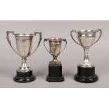 Three silver twin handled presentation trophies to include The Cockshoot cup example, assayed