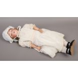An ALT, Beck & Gottshalck 1362 German bisque head doll with jointed composite body.