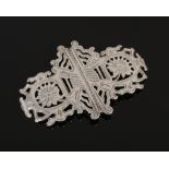 A Victorian openwork silver belt buckle, assayed Birmingham 1889, 34 grams.