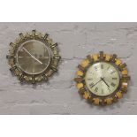 Two Metamec quartz wall clocks.