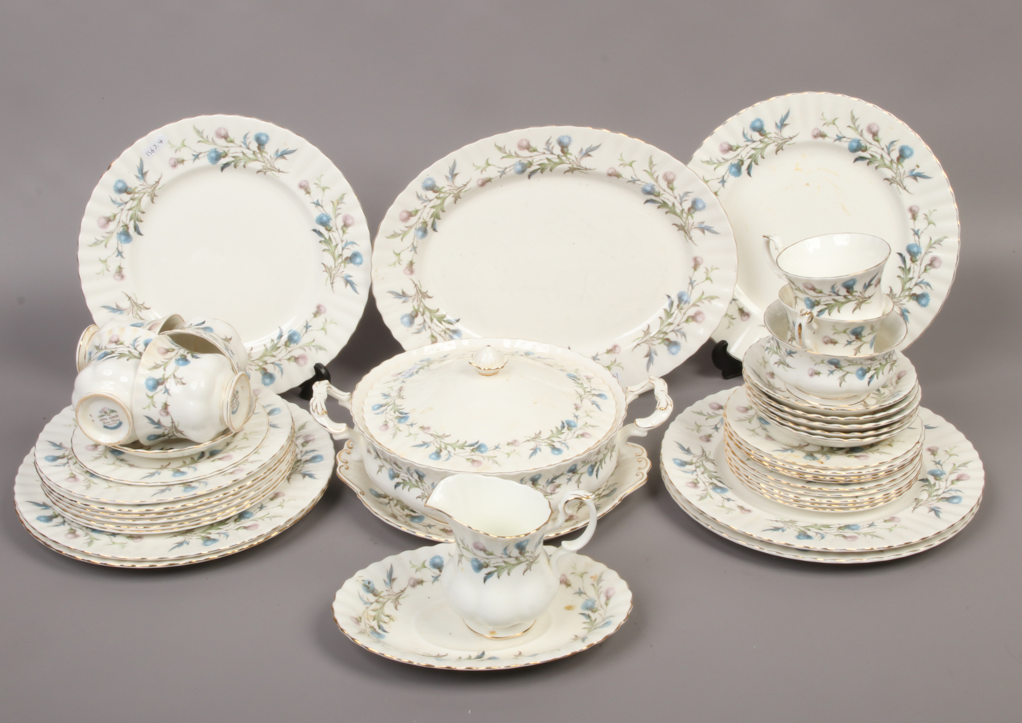A collection of Royal Albert bone china tea / dinnerwares in The Brigadoon design.
