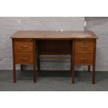 A mid 20th century mahogany knee hole desk.