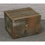 A vintage metal bound wooden crate.