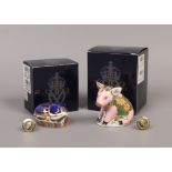 A Royal Crown Derby Sinclair's Pickworth Piglet paperweight with gold stopper, along with a Royal