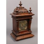 An early 20th century mahogany cased Junghans 8 day bracket clock with brass dial, half hourly