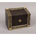 A Victorian Coromandel stationary box decorated with brass strapwork makers Howell, James & Co.