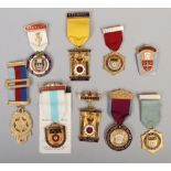 Seven yellow metal masonic badges to include mainly Steward examples.