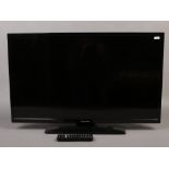 A Panasonic 32inch flat screen television with remote.