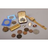 A collection of costume jewellery, commemorative coins, Accurist bracelet watch, brass fob watch,