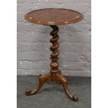 A late 19th early 20th century tripod wine table with dish top and barleytwist support.