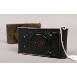 An early 20th century Kodak vest pocket autographic 127 film and camera The Soldiers Camera in