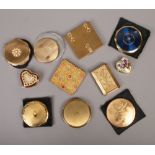 A tray of compacts to include Straton and Kigu examples.