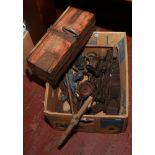 A box of vintage tools to include planes, triangle high load tester, braces etc.