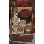 A collection of vintage storing vessels to include Castrol and Mintoes advertising examples and
