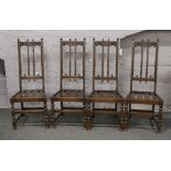 A set of four Ercol Old Colonial high back dining chairs.