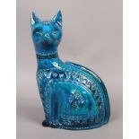 A Bitossi Italian studio pottery stylized model of a seated cat. Turquoise glazed and having incised