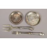 A small collection of silver to include pin dish with 1904 Indian rupee, silver handle fork etc.