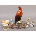 A Beswick Beneagles golden eagle ceramic decanter, along with a collection of Beswick, Royal Doulton