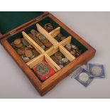 A wooden collectors chest to include British pre-decimal coins, commemorative crowns etc.