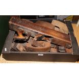 A box of antique joiners block planes.