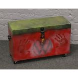 A fitted wooden tool chest later painted with VW logos.