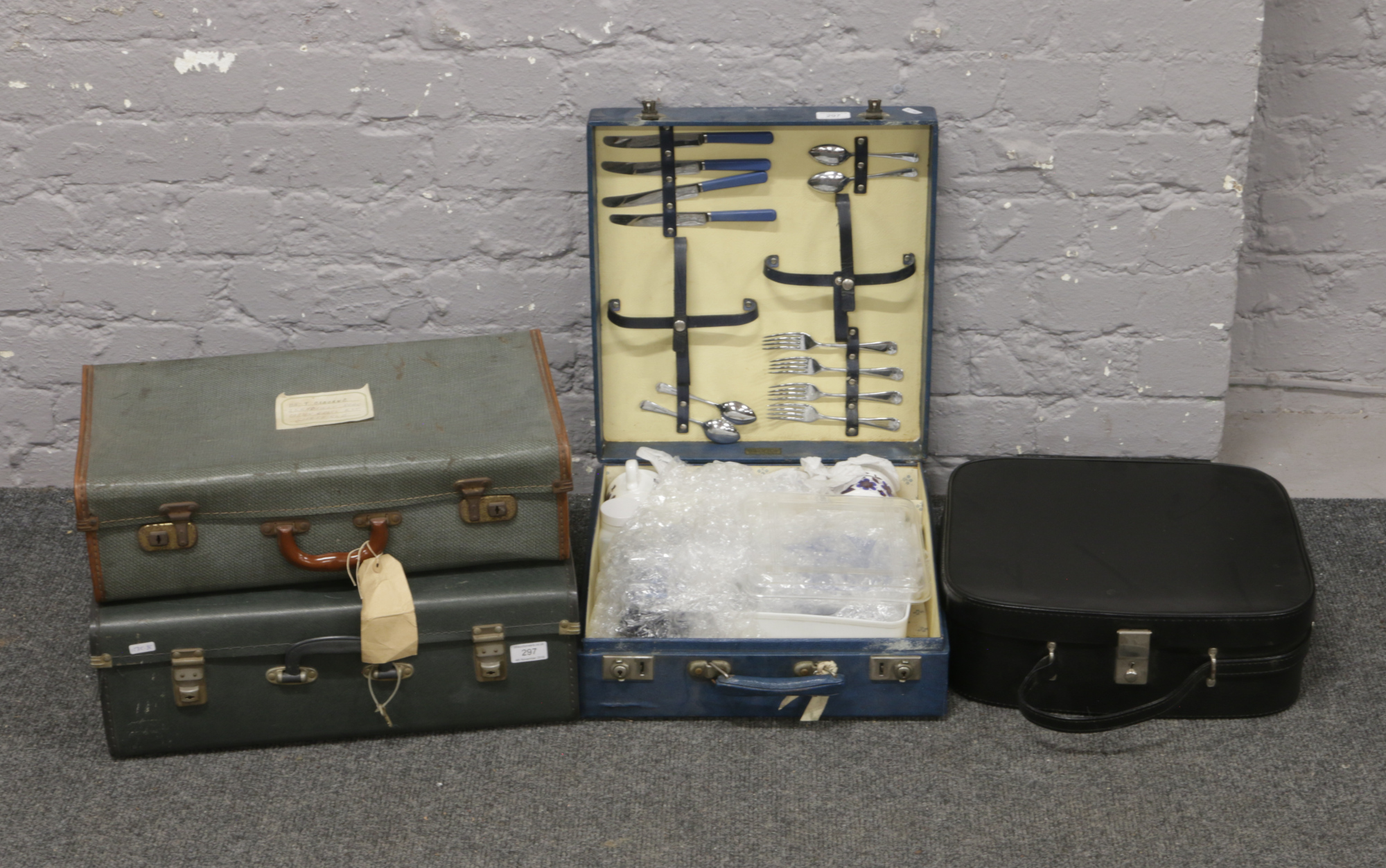 A vintage Brexton picnic set and three vintage cases.