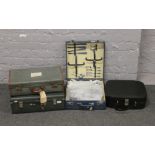 A vintage Brexton picnic set and three vintage cases.