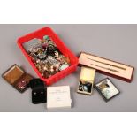 A box of costume jewellery to include silver and marcasite brooch, clip on earrings, bracelets etc.