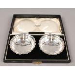 A cased pair of silver bon bon dishes, assyed Chester 1922 by Stokes & Iceland Ltd, 110 grams.