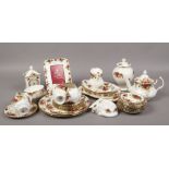A quantity of Royal Albert ceramics in The Old Country Roses design to include teapot, clock,