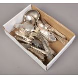 A continental silver plate six place cutlery set with scrollwork decoration stamped grade 90.