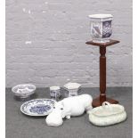 A hardwood jardiniere stand, along with a collection of pottery to include Pandaware  jardiniere,