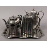 A group of metalwares to include three part tea set, James Dixon & Sons hot water pot etc.