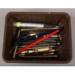A box of pens and pencils to include Walpamor propelling pencil, Messenger ballpoint pen, rolled