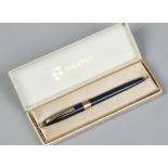 A cased Sheaffer fountain pen with 14ct gold nib.