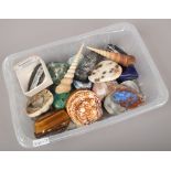 A box of fossils and geological specimens to include polished Tigers eye, orthoceras, sea shells