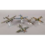 Five Corgi Diecast metal scale model aircraft including spitfire, hurricane, F4U Corsair, Avro