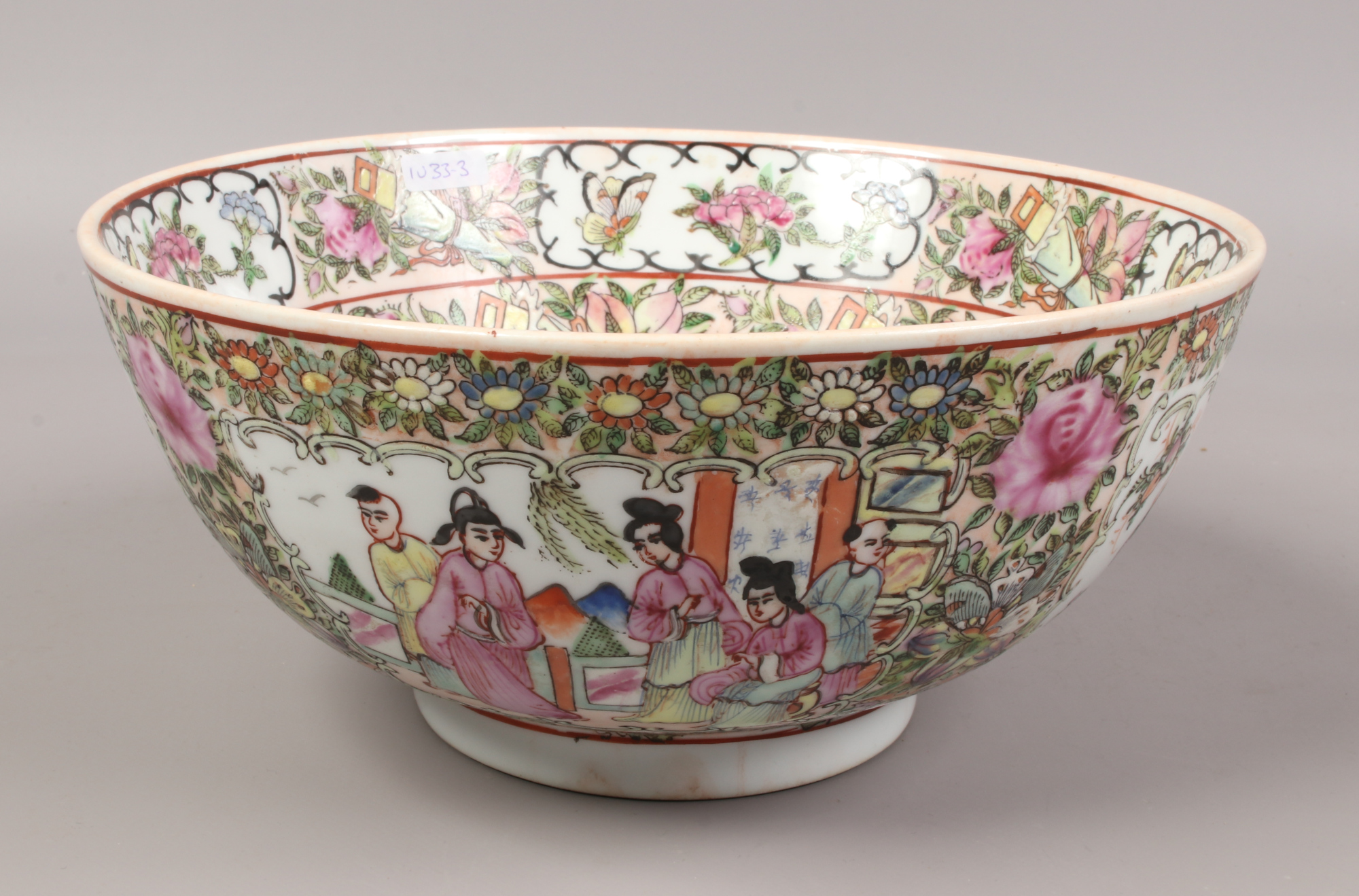 A Chinese famille rose bowl 25cm diameter x 15cm high with six character marks to the base.