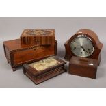 Four wooden boxes one formed as a book, along with a walnut Enfield Westminster chime mantle clock.