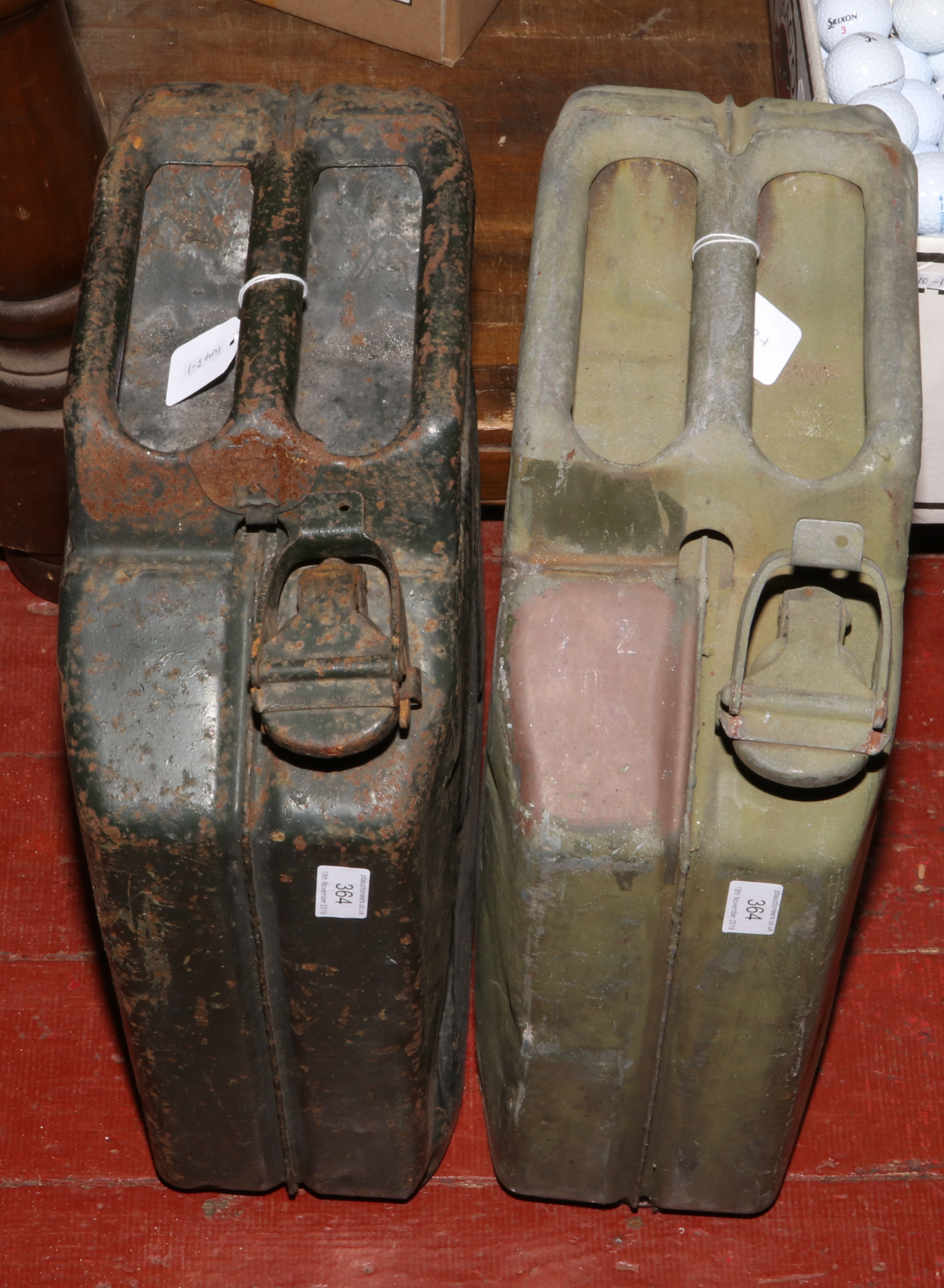 Two vintage military jerry cans one second World War dated 1945 the other 1965.