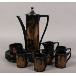 A Portmerion six place coffee set decorated in the phoenix design.