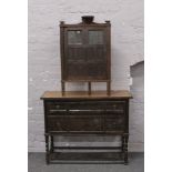 A carved and panelled oak floor standing corner cupboard, along with a chest of two drawers,