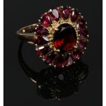 A 9ct gold and garnet cluster ring with certificate, size N.