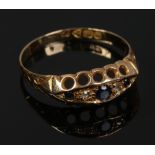 An Edwardian 18ct gold sapphire and diamond 5 stone set ring, assayed 1909, size Q.