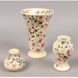 Three Moorcroft vases in The Tembusu design including one decorated by Sian Leeper, tallest 15.5cm.