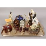 A tray lot of oriental wares to include ceramic figures, Buddhas, lidded vase etc.